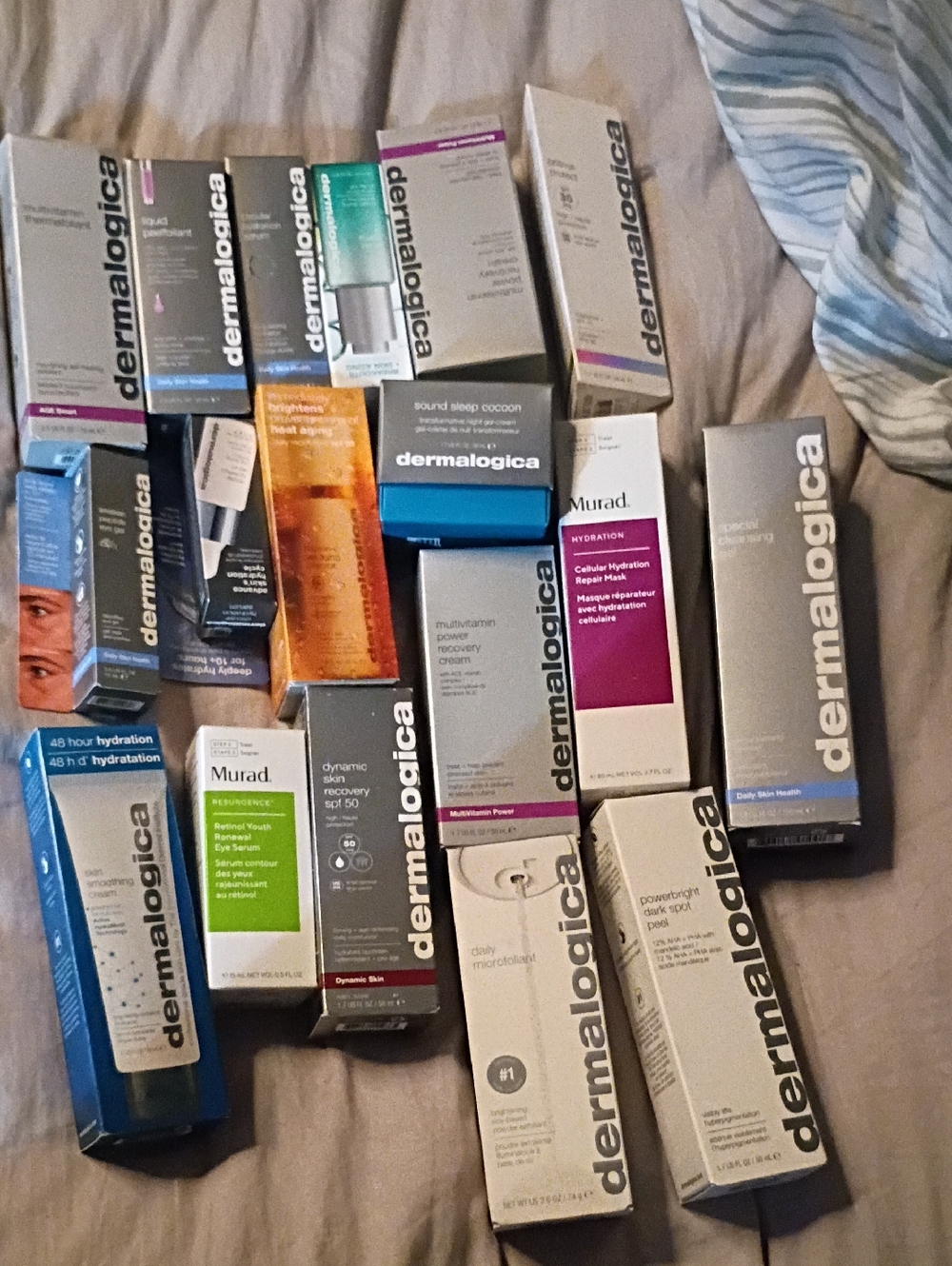 dermalogica Assorted Skincare Boxes in Silver, White, Blue & Purple